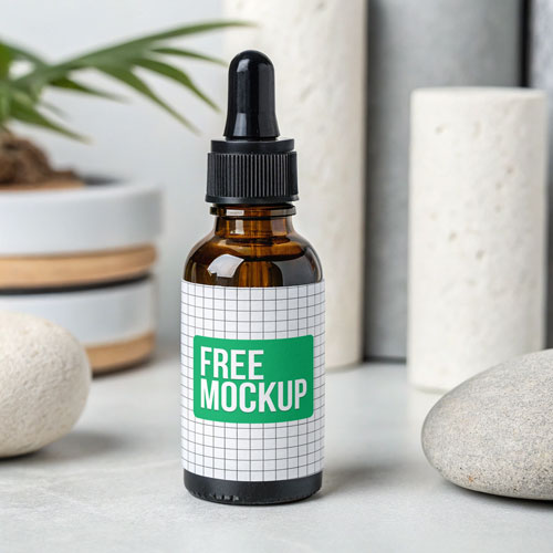 Free Zen Amber Dropper Bottle PSD Mockup — Spa Setting PSD mockup for Adobe Photoshop
