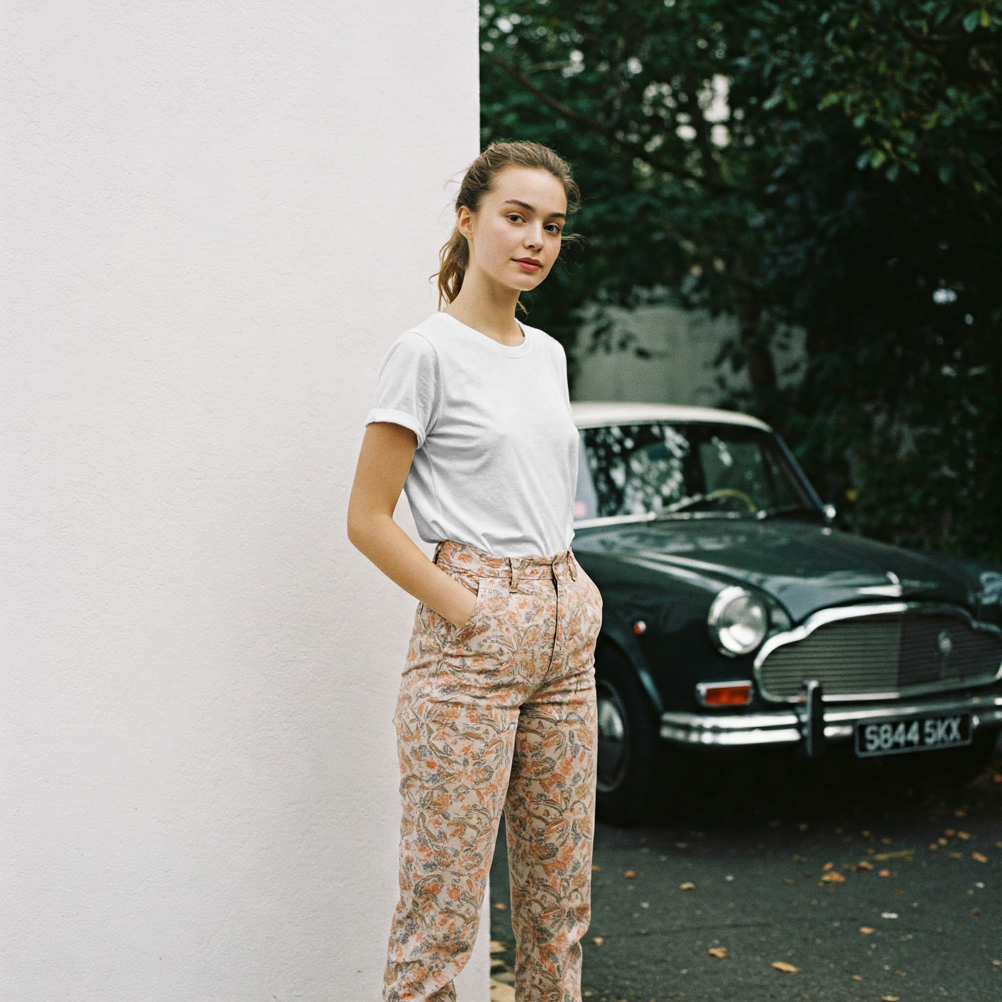 Free Online T-Shirt Mockup — Stylish Model with Classic Vintage Car