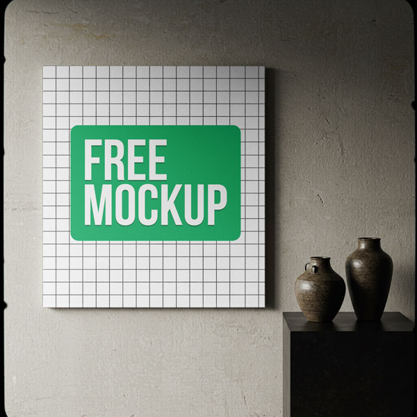 Modern Canvas on Textured Wall Free Mockup. A square canvas print with a company logo design hangs on a textured, concrete-style wall. To the right, two dark, rustic vases sit on a black pedestal under moody lighting.